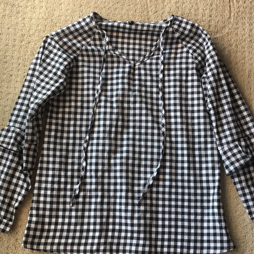Black and white blouse from Vici